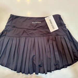 Gold Hinge black pleated tennis skirt.